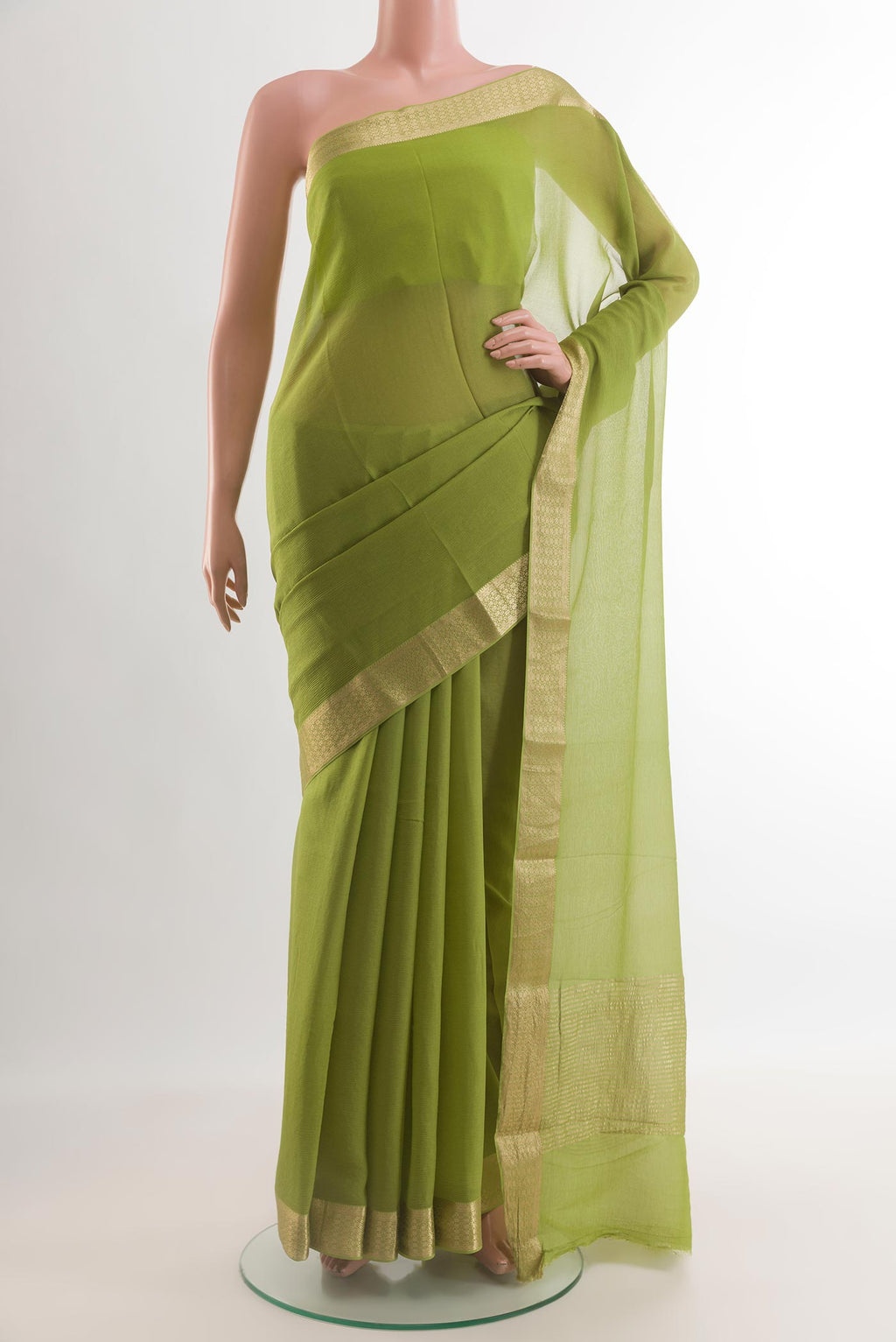Green Mysore Chiffon Saree with Plain Body and Zari Border.  displayed on a mannequin