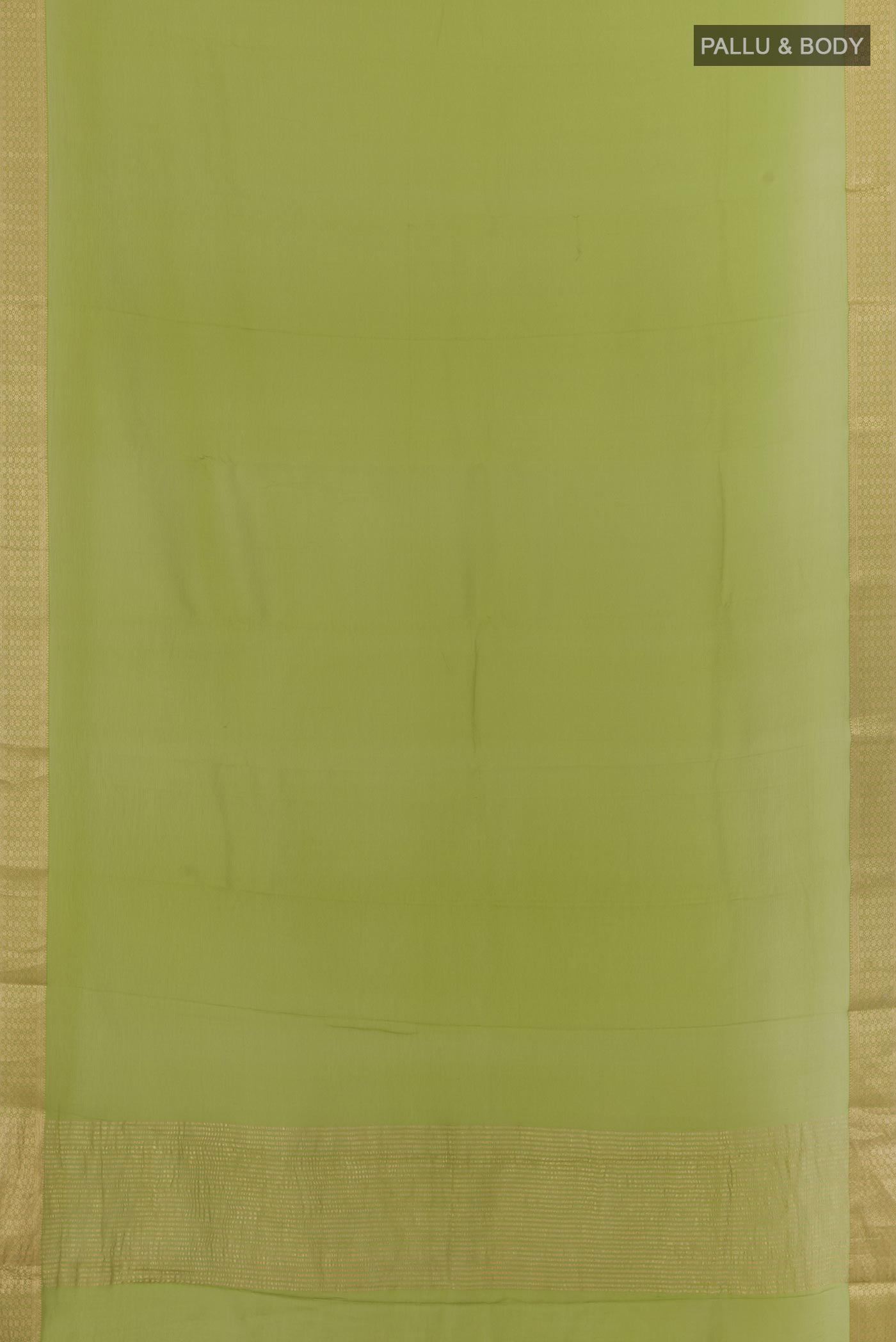 Flat view of Green Mysore Chiffon Saree with Plain Body and Zari Border. 
