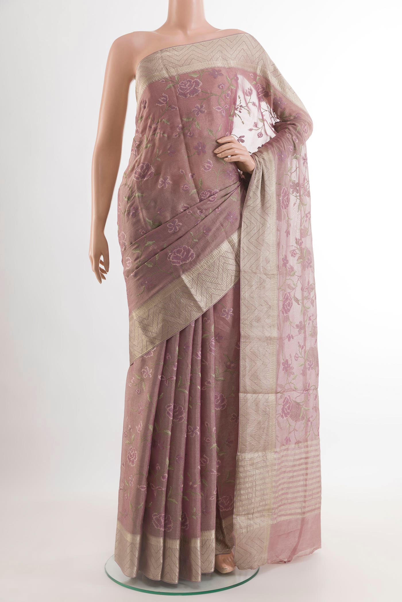 Lavender Mysore Georgette Saree with Embroidery on the body and Zari Border.  displayed on a mannequin