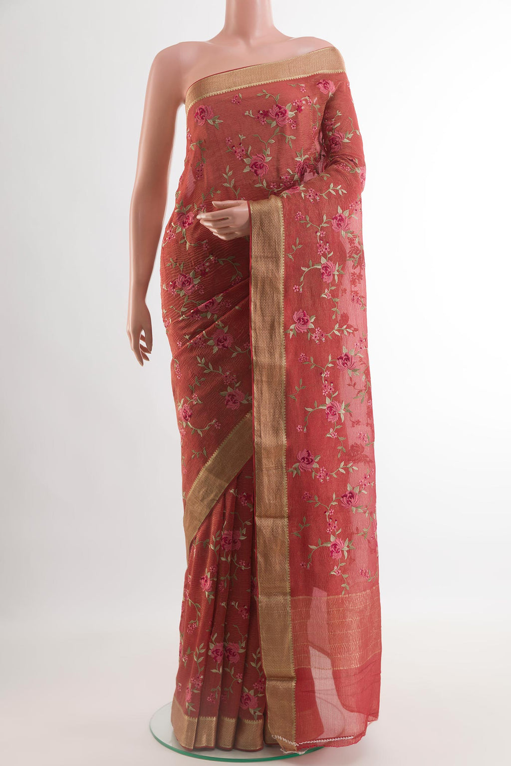 Coral Mysore Georgette Saree with Embroidery on the body and Zari Border.  displayed on a mannequin
