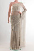 Grey Mysore Chiffon Saree with Stripes on the body and Zari Border.  displayed on a mannequin
