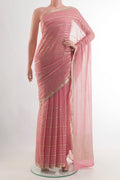 Pink Mysore Chiffon Saree with Stripes on the body and Zari Border.  displayed on a mannequin
