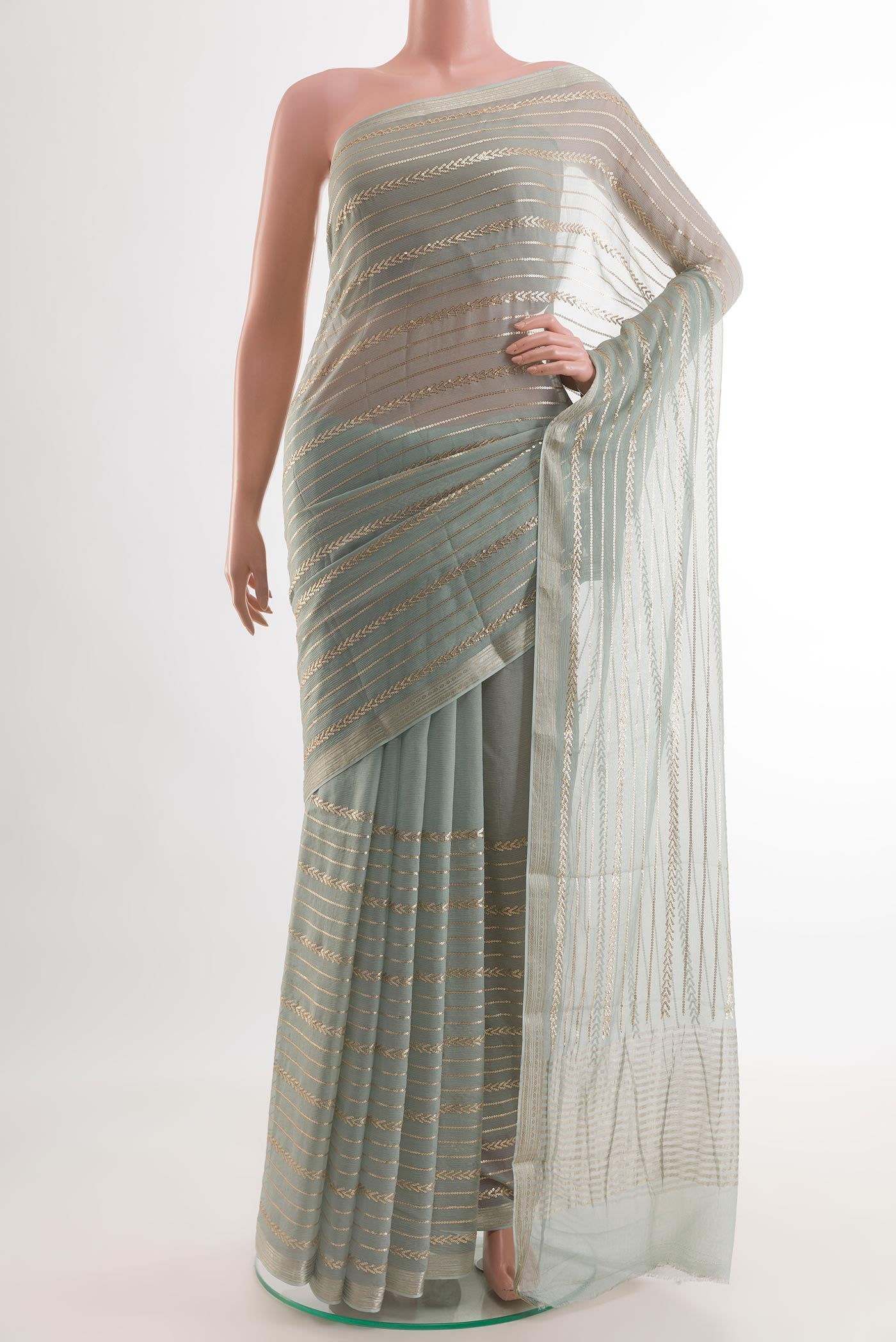 Grey Mysore Chiffon Saree with Embroidery on the body and Embroidery Border.  displayed on a mannequin