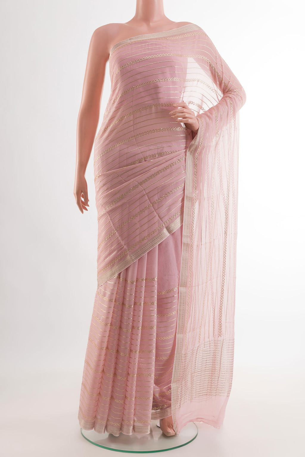 Rose pink Mysore Chiffon Saree with Embroidery on the body and Zari Border.  displayed on a mannequin