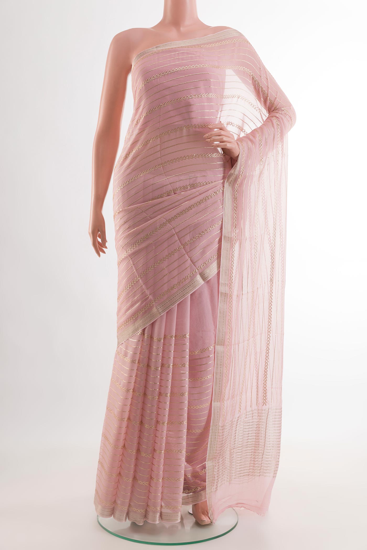 Rose pink Mysore Chiffon Saree with Embroidery on the body and Zari Border.  displayed on a mannequin