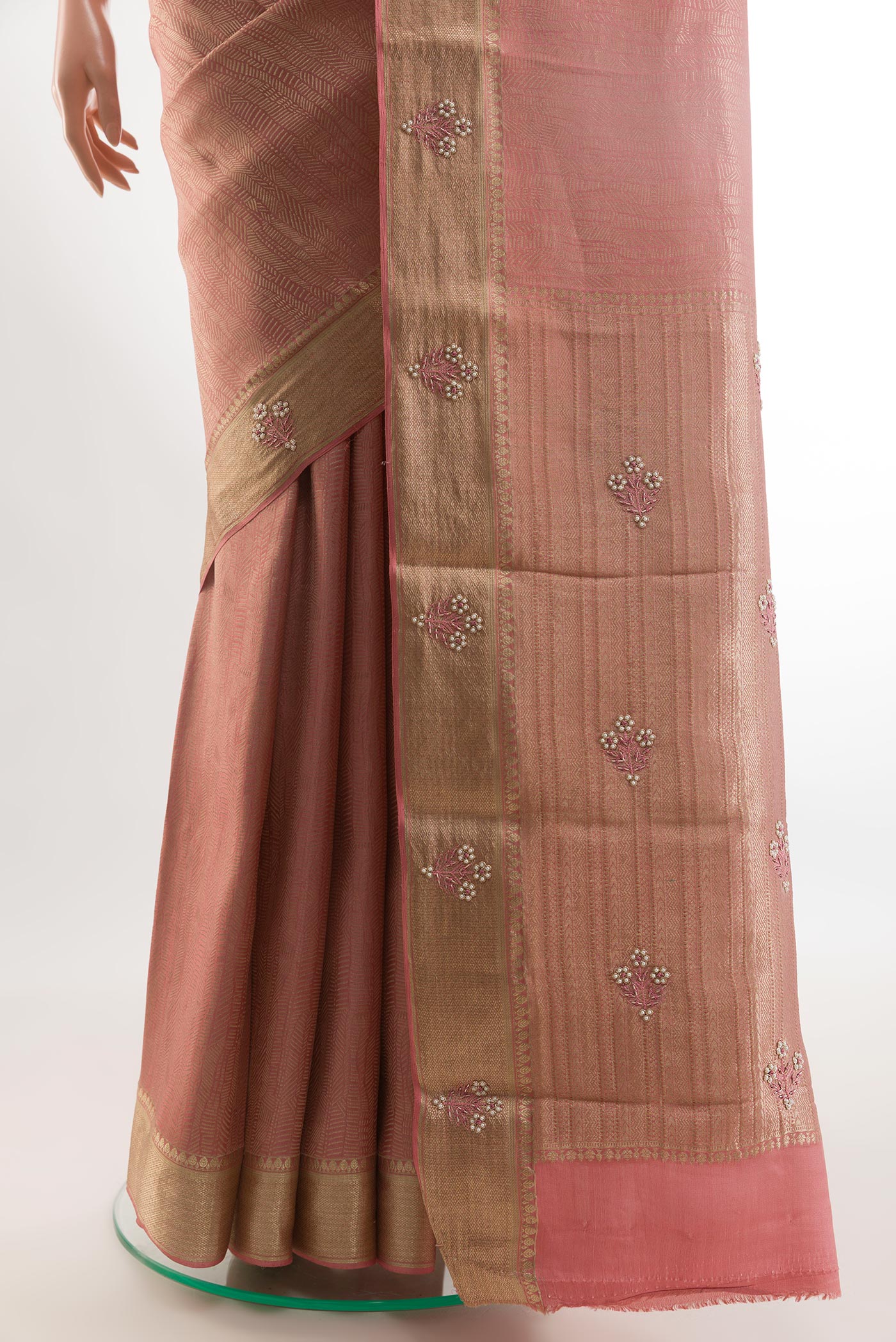 Pleats and pallu of Rose Gold Mysore Crepe Saree with Zari Brocade on the body and Zari Border. 
