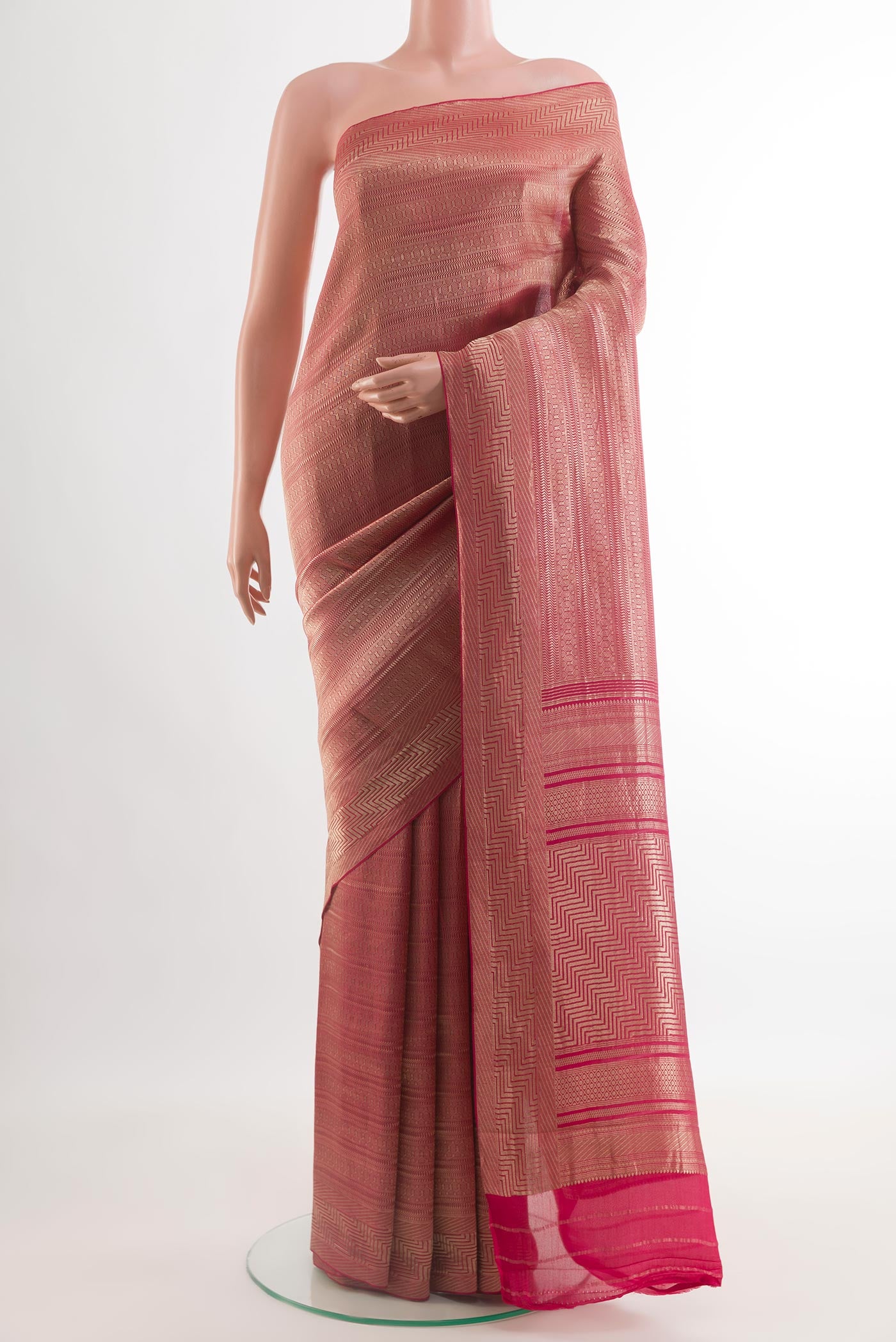 Pink Mysore Crepe Saree with Zari Brocade on the body and Zari Border.  displayed on a mannequin
