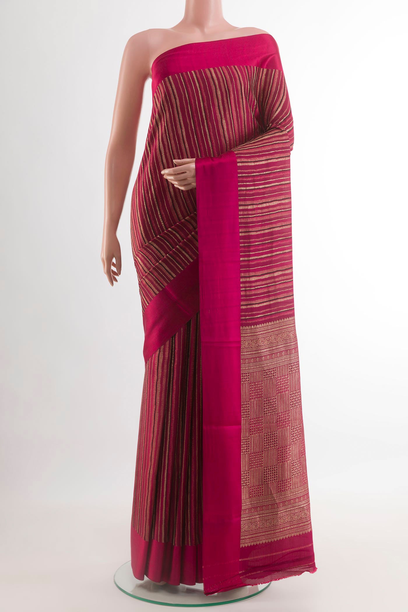 Dark Pink Mysore Crepe Saree with Stripes on the body and Plain Border.  displayed on a mannequin