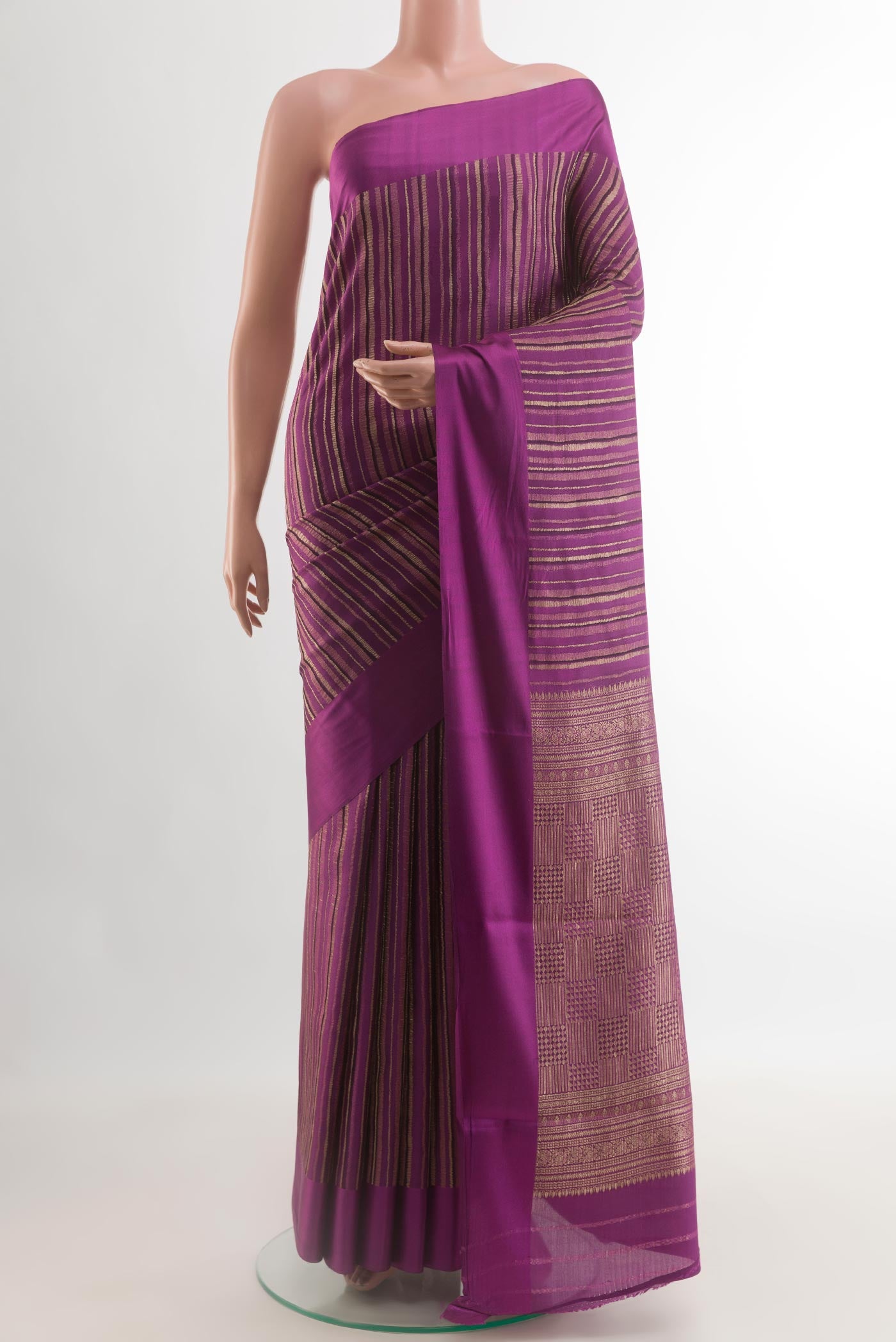 Purple Mysore Crepe Saree with Stripes on the body and Zari Border.  displayed on a mannequin
