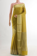 Mehandi Green Mysore Crepe Saree with Plain Body and Zari Border.  displayed on a mannequin