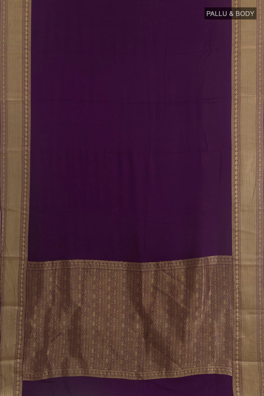 Flat view of Purple Mysore Crepe Saree with Plain Body and Zari Border. 
