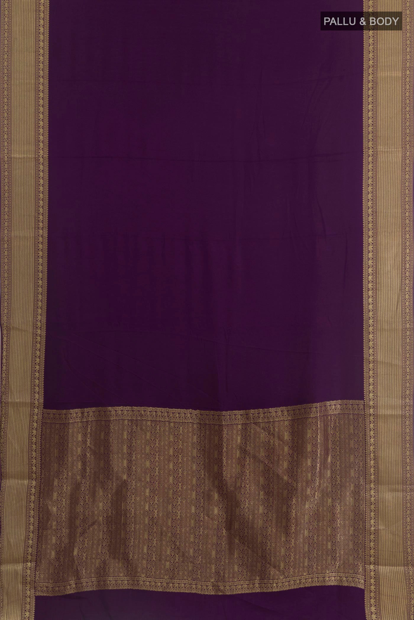 Flat view of Purple Mysore Crepe Saree with Plain Body and Zari Border. 