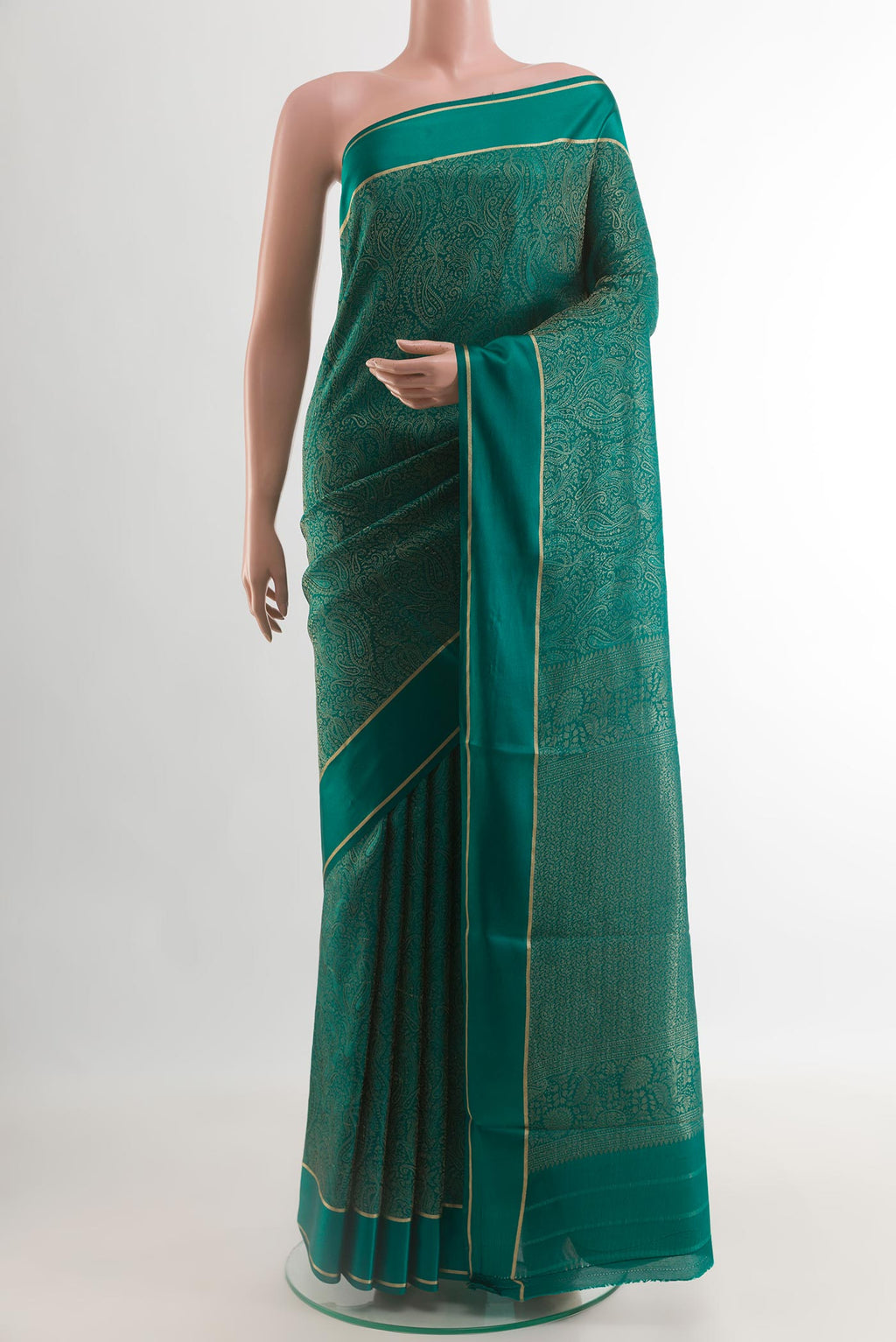 Teal Mysore Crepe Saree with Zari Brocade on the body and Zari Border.  displayed on a mannequin