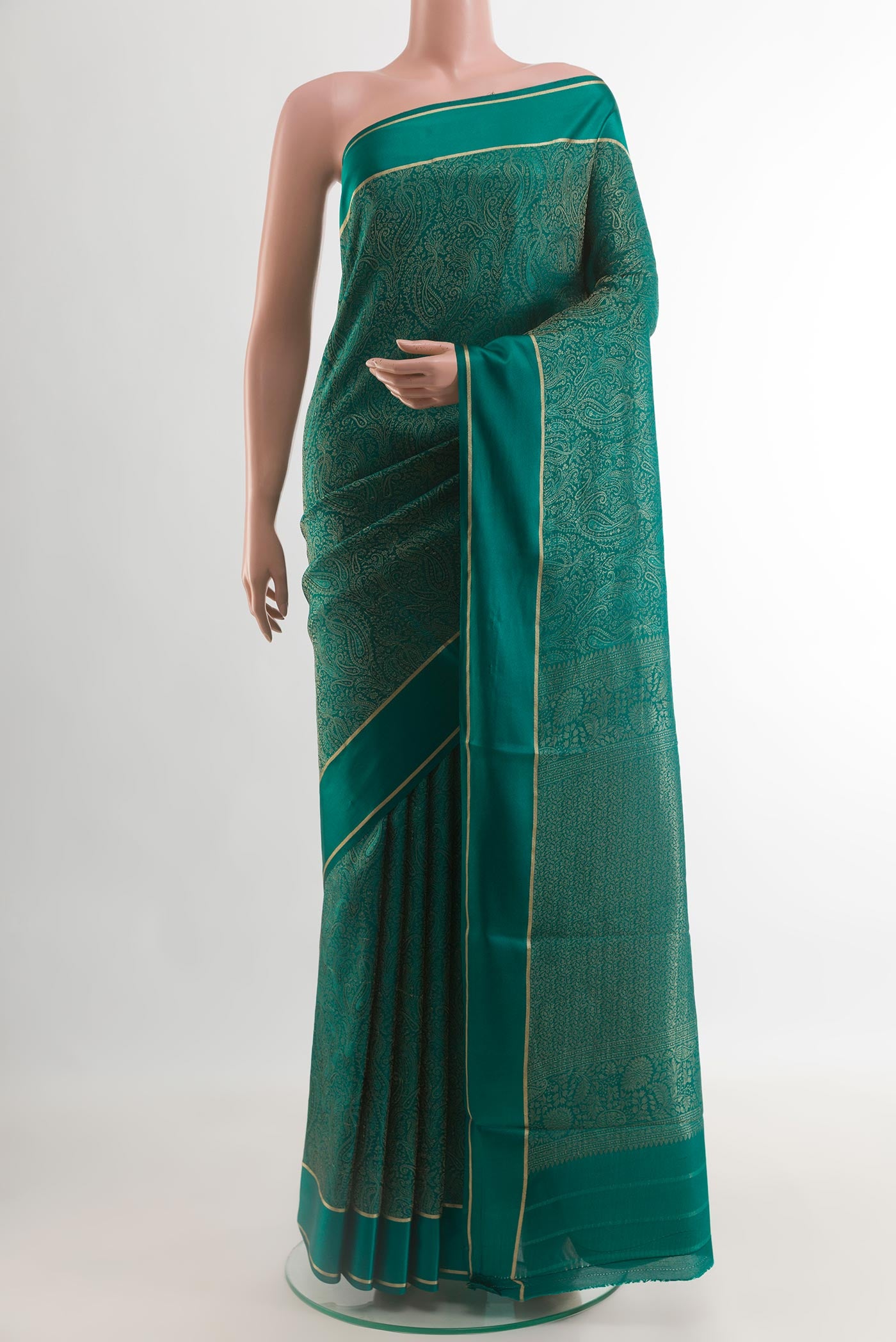 Teal Mysore Crepe Saree with Zari Brocade on the body and Zari Border.  displayed on a mannequin