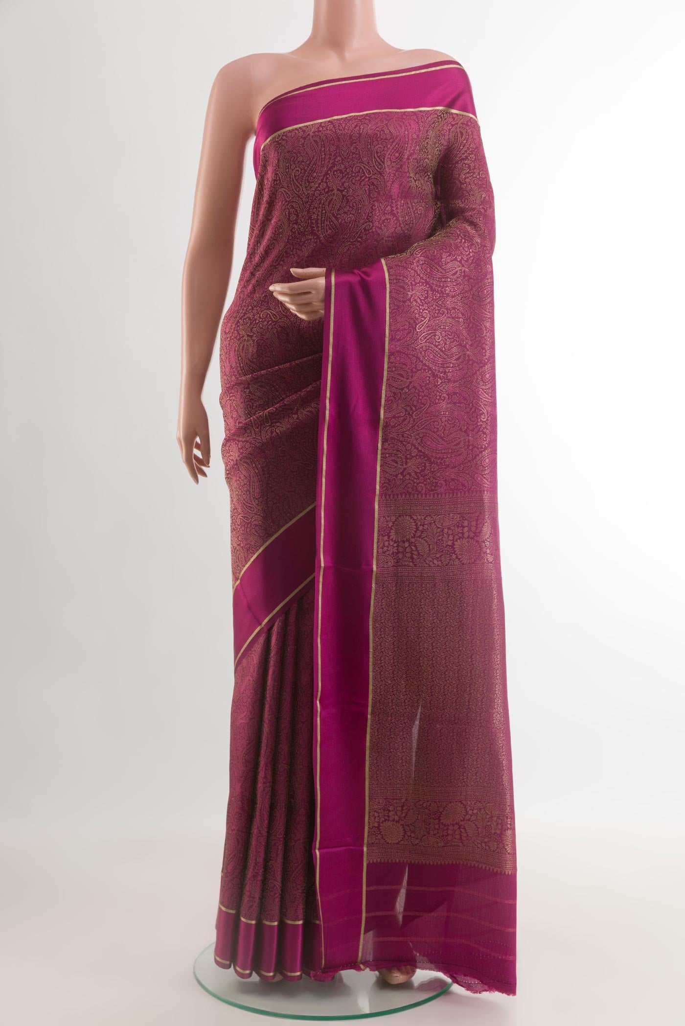 Magenta Mysore Crepe Saree with Zari Brocade on the body and Zari Border.  displayed on a mannequin