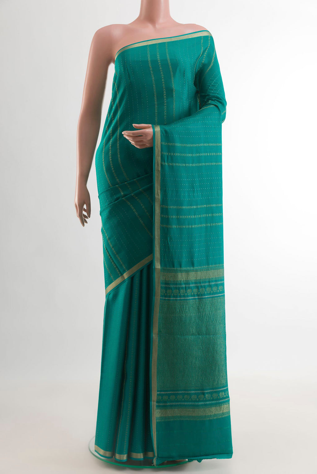Sea Green Mysore Crepe Saree with Stripes on the body and Zari Border.  displayed on a mannequin