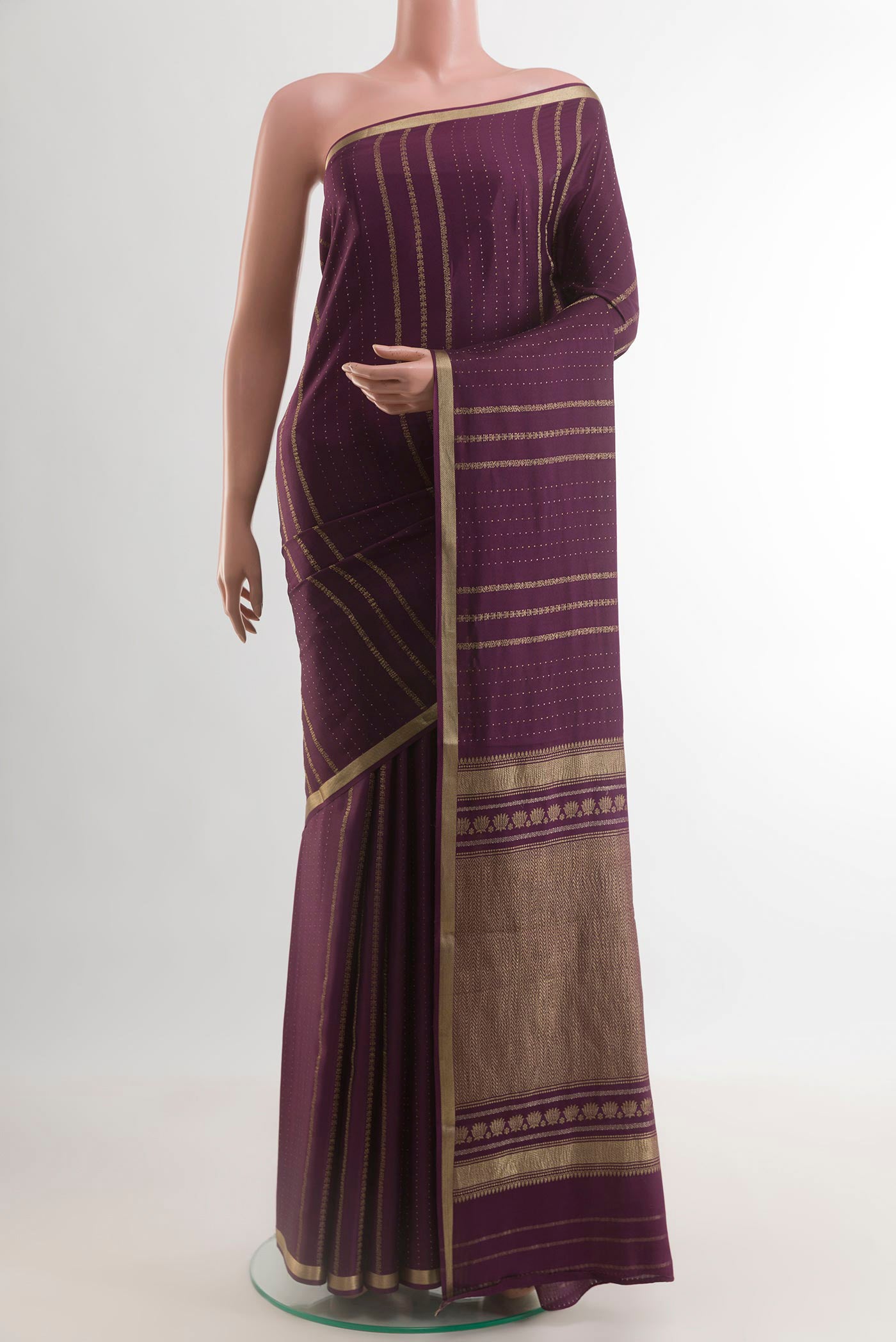 Purple Mysore Crepe Saree with Stripes on the body and Zari Border.  displayed on a mannequin