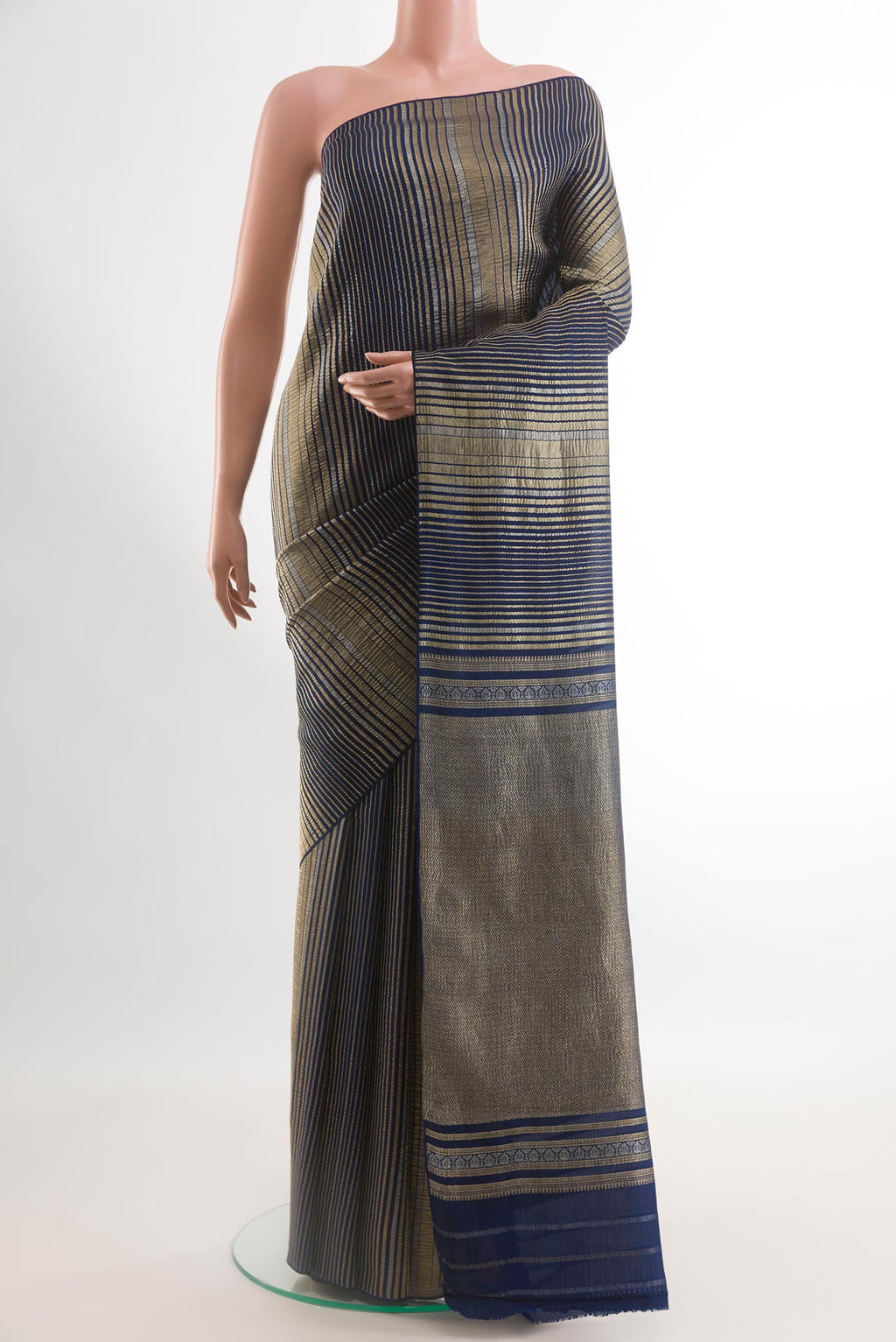 Navy Blue Mysore Crepe Saree with Zari Brocade on the body and Without Border.  displayed on a mannequin