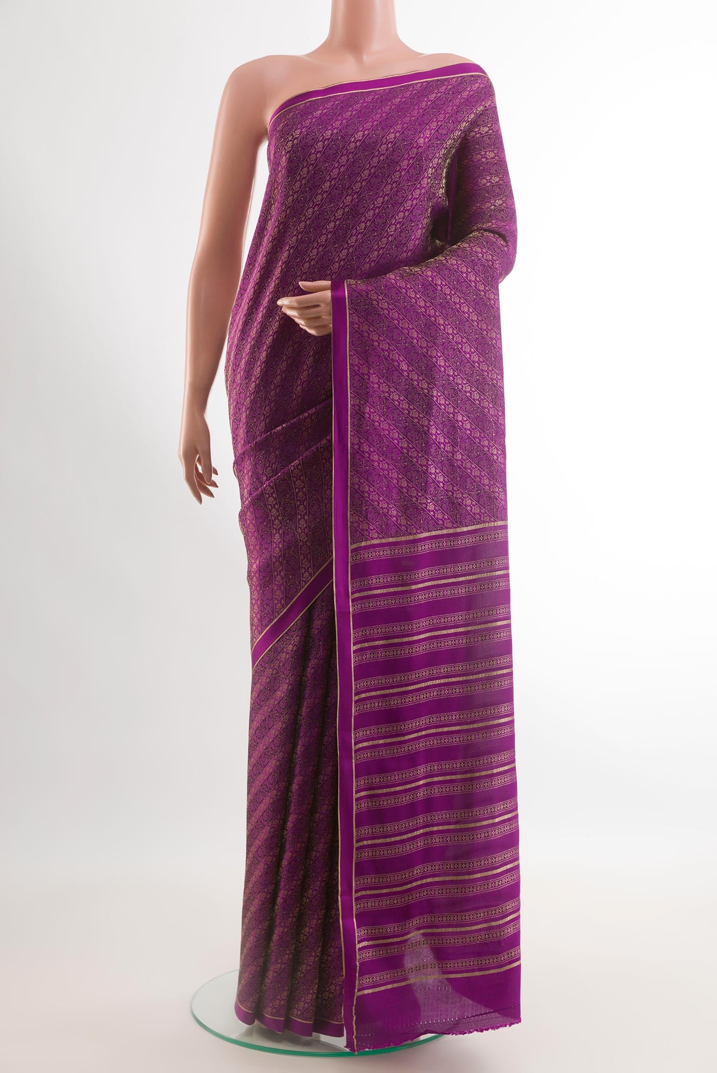 Purple Mysore Crepe Saree with Zari Brocade on the body and Zari Border.  displayed on a mannequin