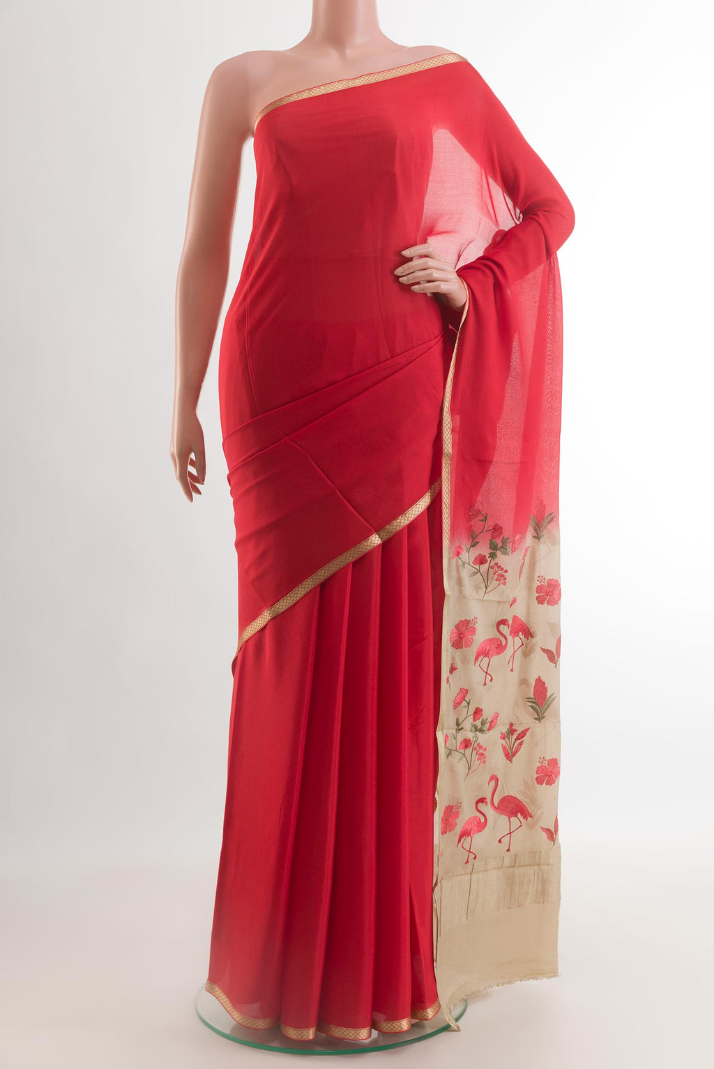 Red Mysore Crepe Saree with Plain Body and Zari Border.  displayed on a mannequin