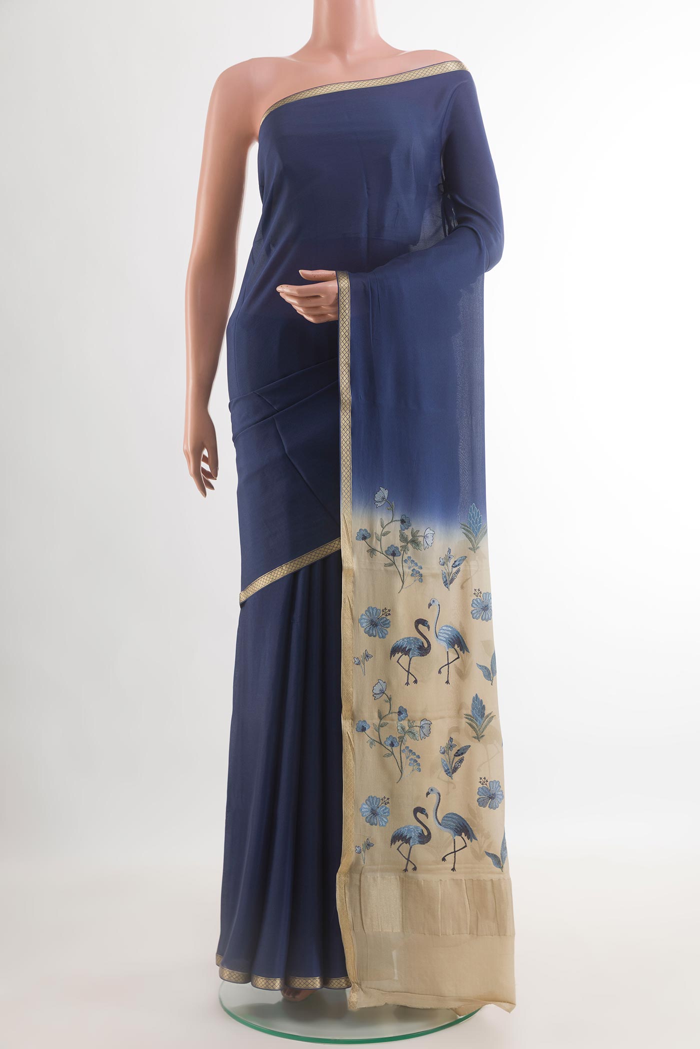 Blue Mysore Crepe Saree with Plain Body and Zari Border.  displayed on a mannequin