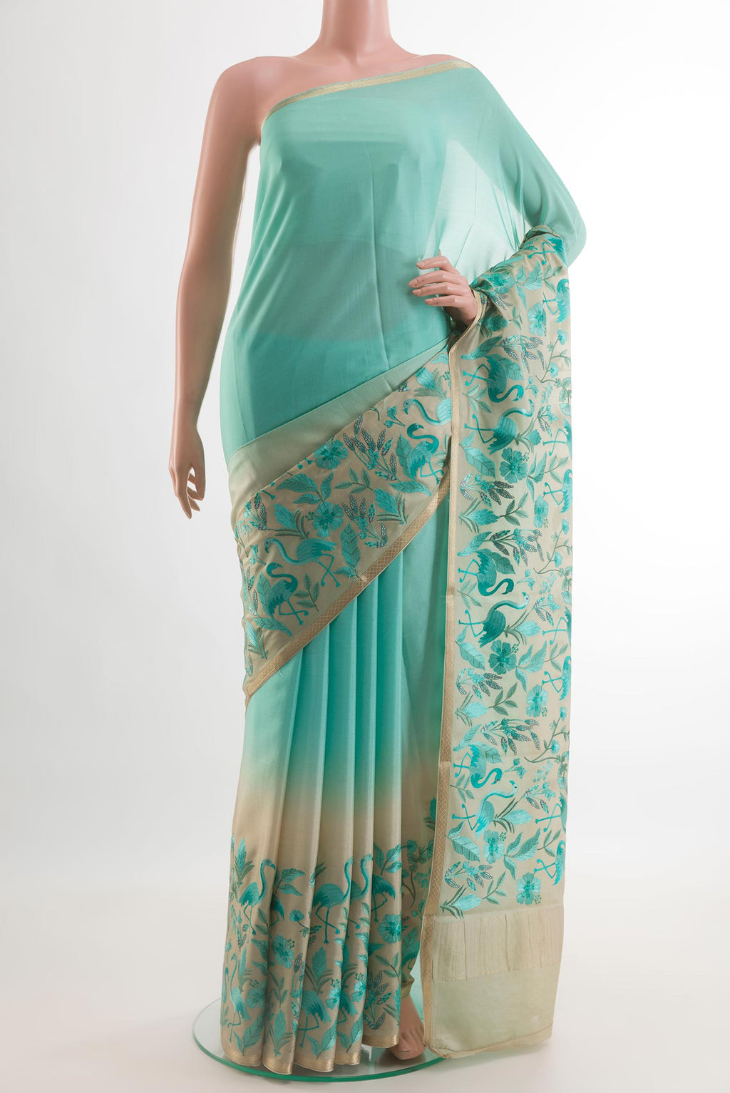 Sky Blue Mysore Crepe Saree with Plain Body and Zari Border.  displayed on a mannequin