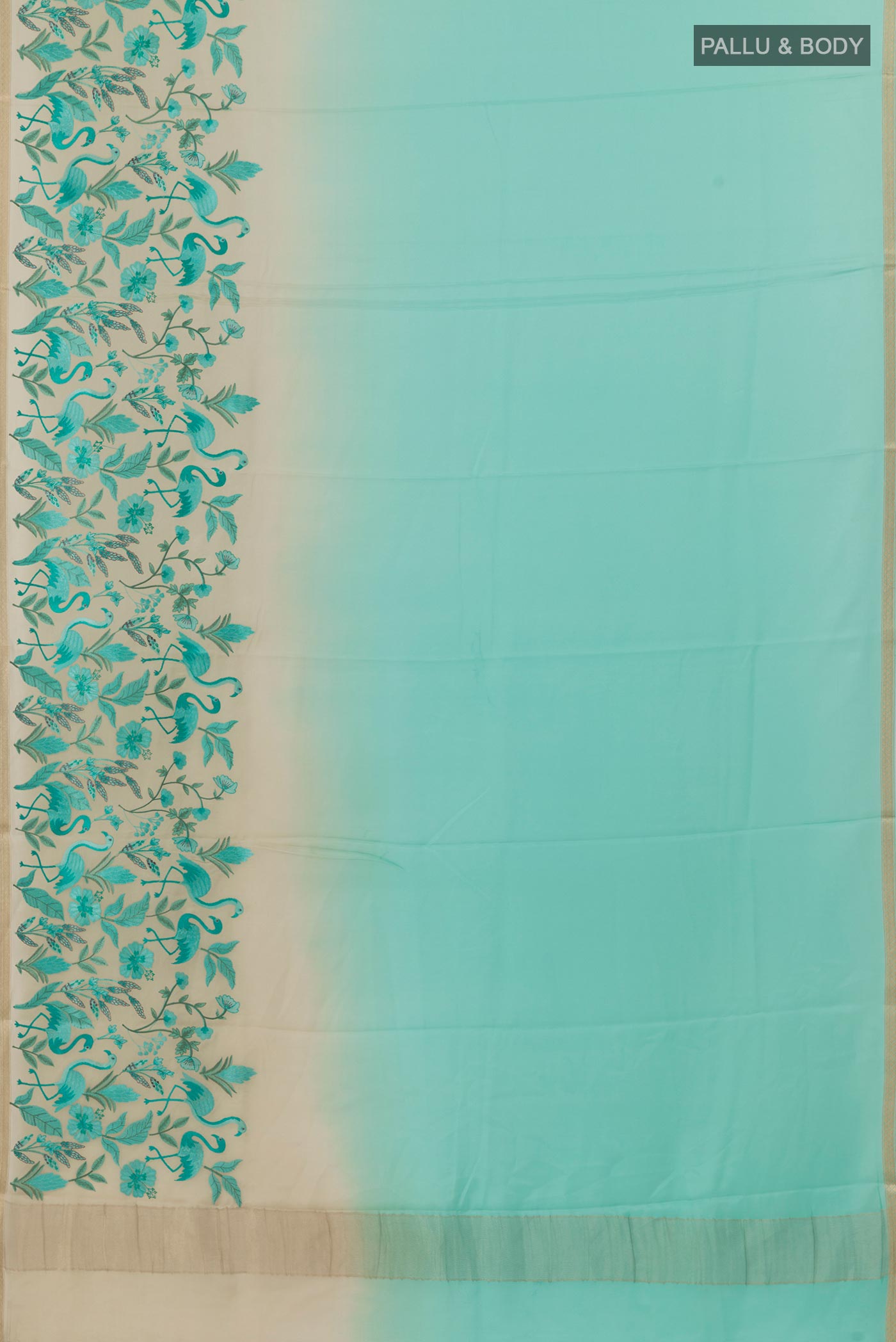 Flat view of Sky Blue Mysore Crepe Saree with Plain Body and Zari Border. 