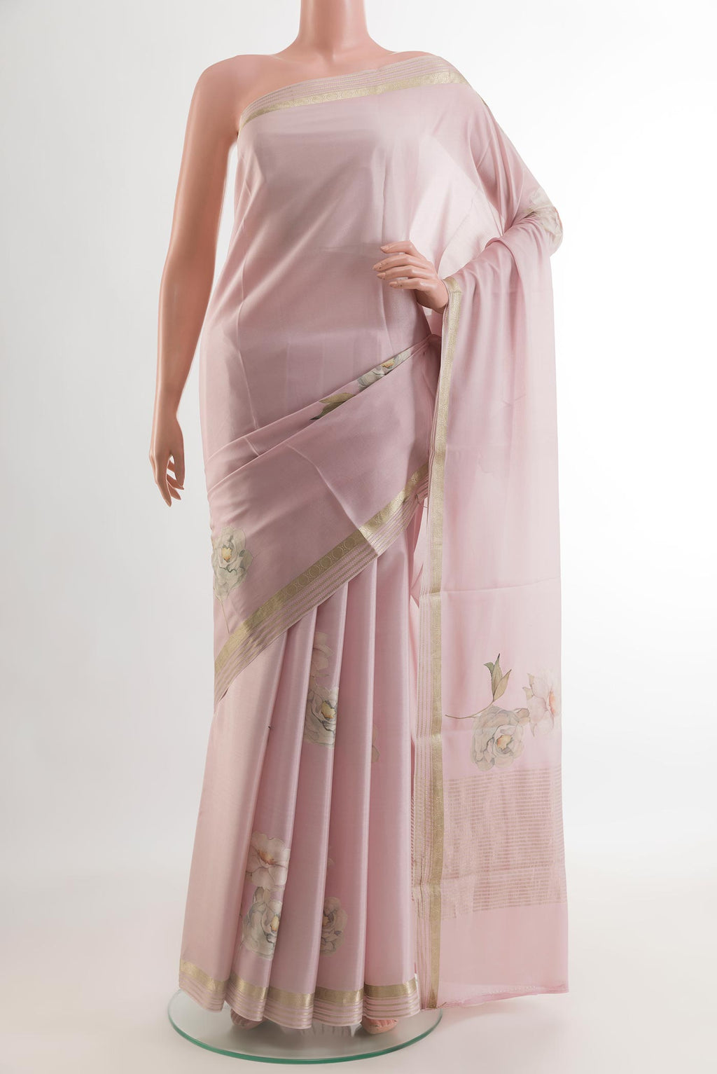 Rose pink Mysore Crepe Saree with Floral Print on the body and Zari Border.  displayed on a mannequin