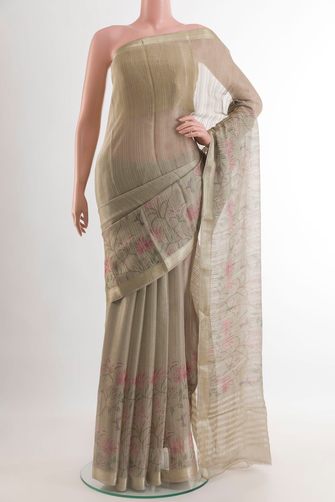 Grey Mysore Georgette Saree with Stripes on the body and Zari Border.  displayed on a mannequin