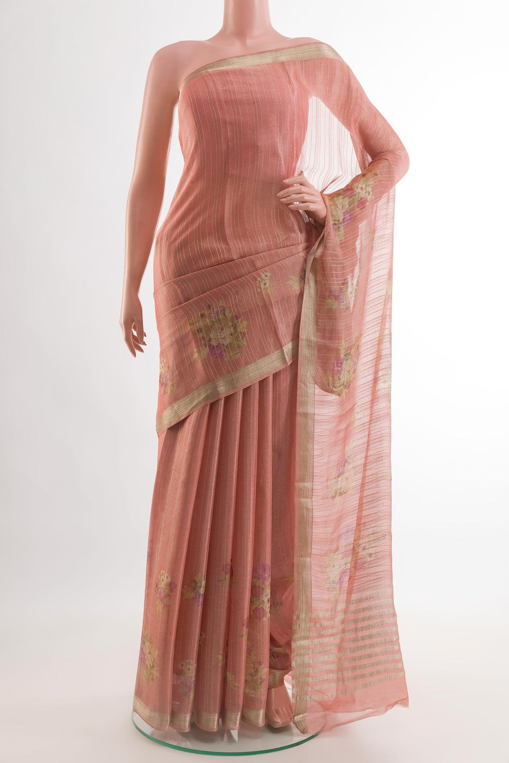Rose Gold Mysore Georgette Saree with Stripes on the body and Zari Border.  displayed on a mannequin