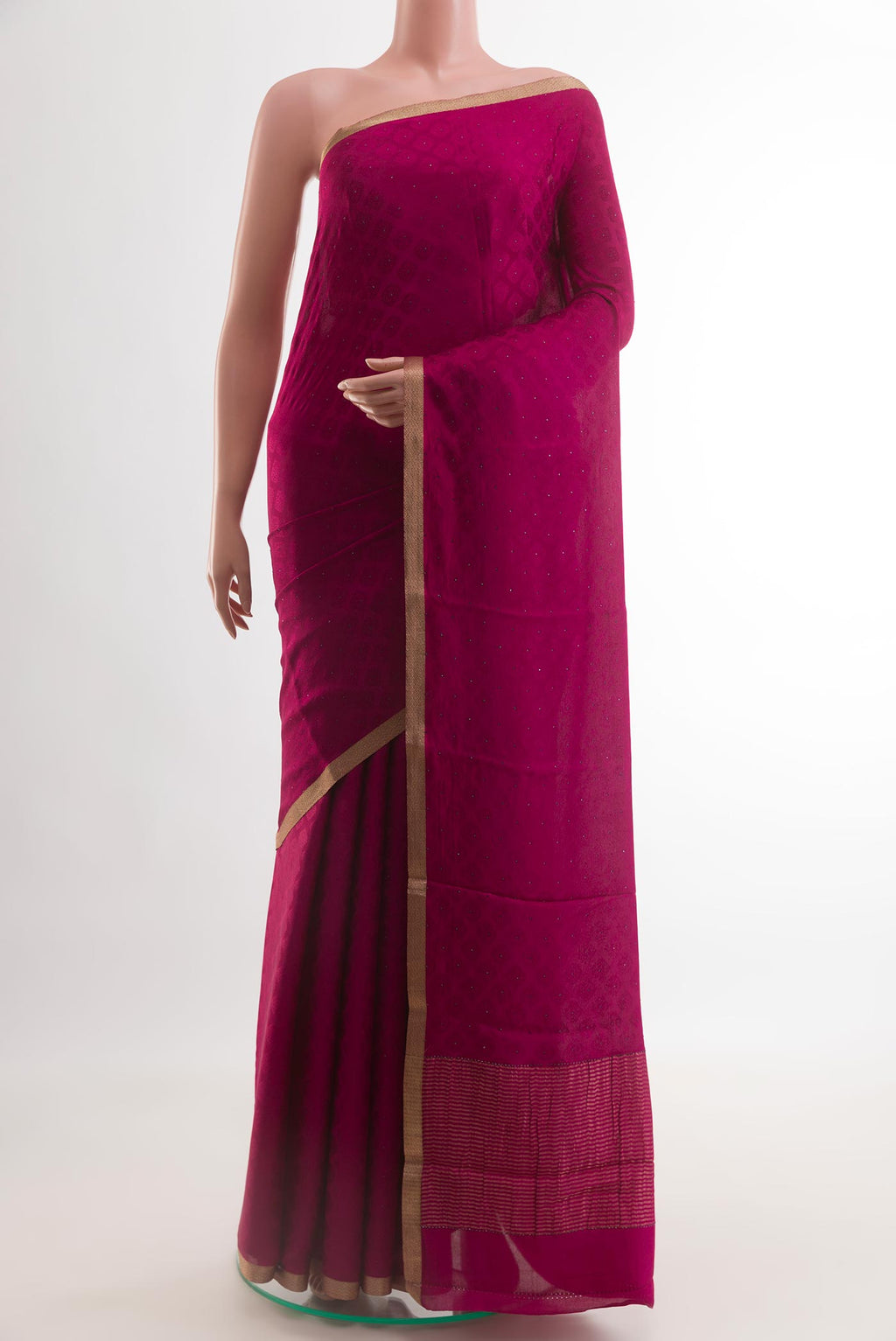 Dark Pink Mysore Crepe Saree with Jacquard design on the body and Zari Border.  displayed on a mannequin
