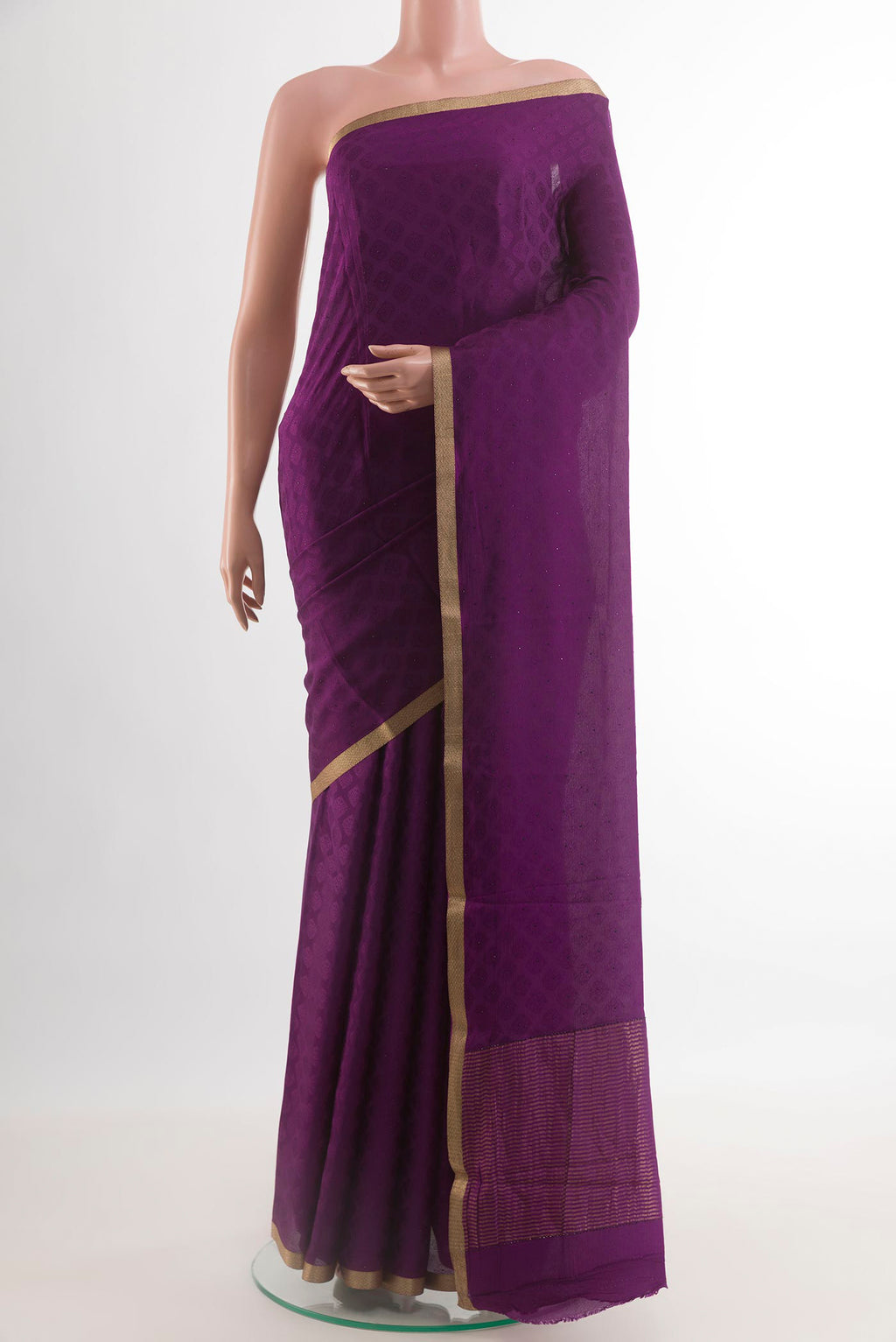 Purple Mysore Crepe Saree with Jacquard design on the body and Zari Border.  displayed on a mannequin