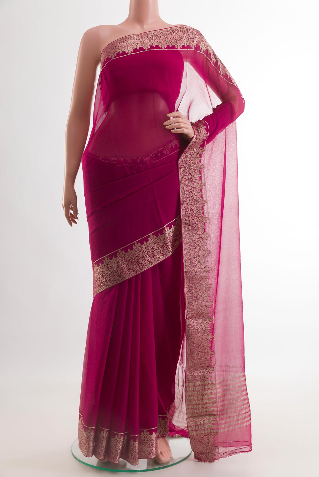 Magenta Mysore Chiffon Saree with Plain Body and Zari Border.  displayed on a mannequin