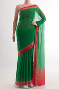 Green Mysore Chiffon Saree with Plain Body and Zari Border.  displayed on a mannequin