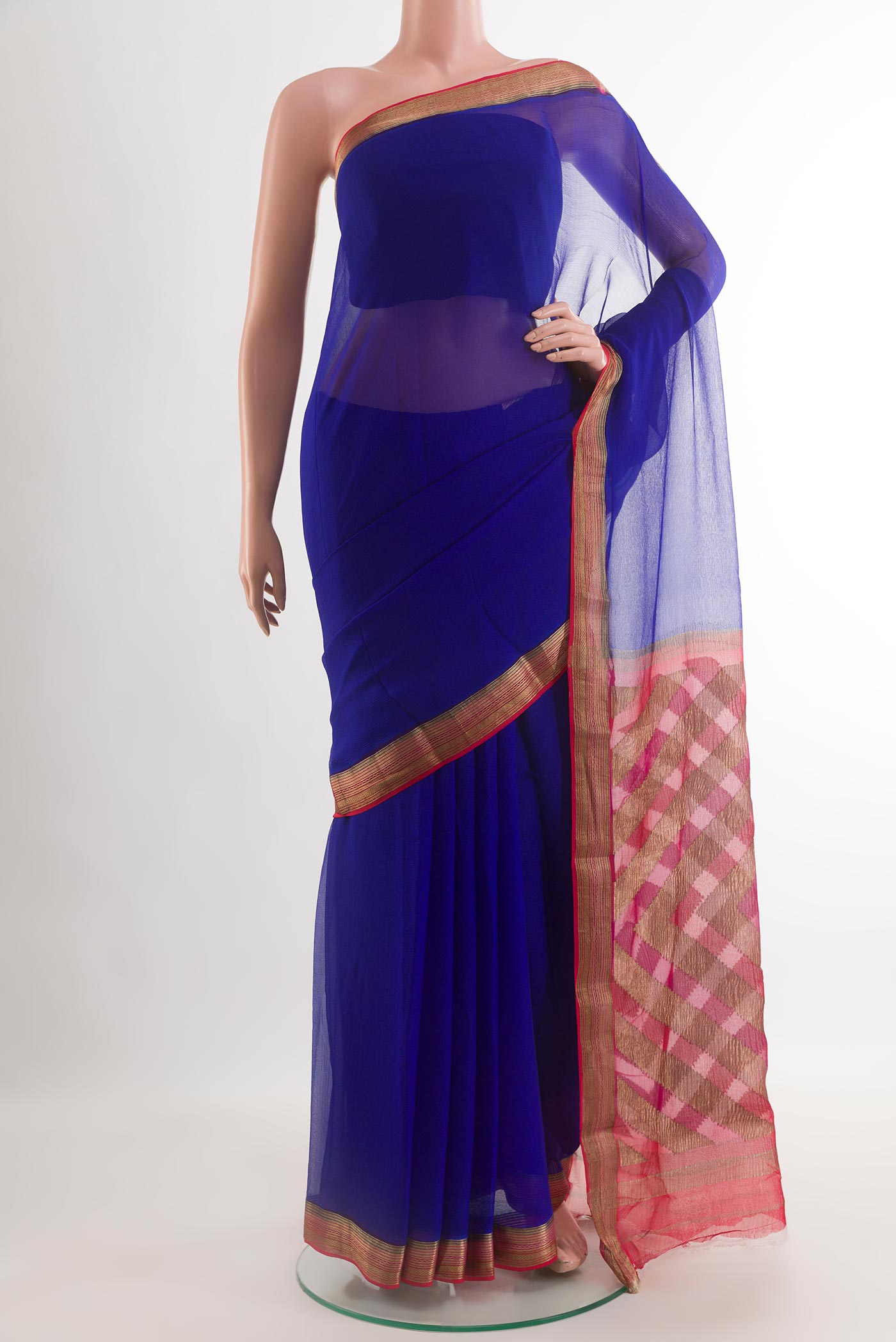Blue Chiffon Saree with Plain Body and Zari Border.  displayed on a mannequin