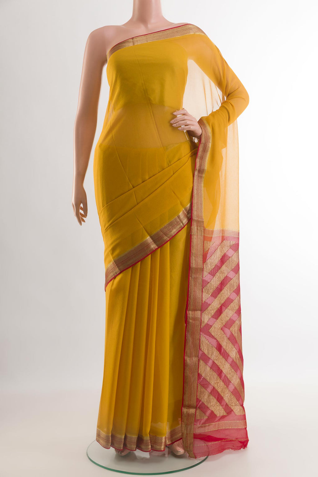 Yellow Mysore Chiffon Saree with Plain Body and Zari Border.  displayed on a mannequin