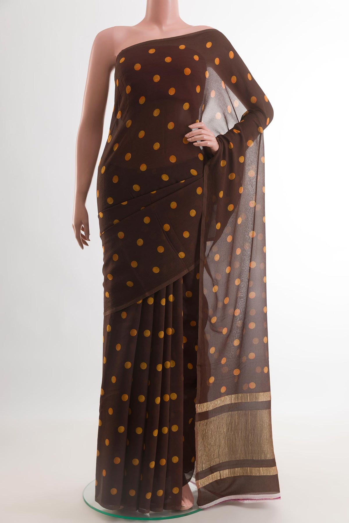 Brown Mysore Chiffon Saree with Printed design on the body and Without Border.  displayed on a mannequin