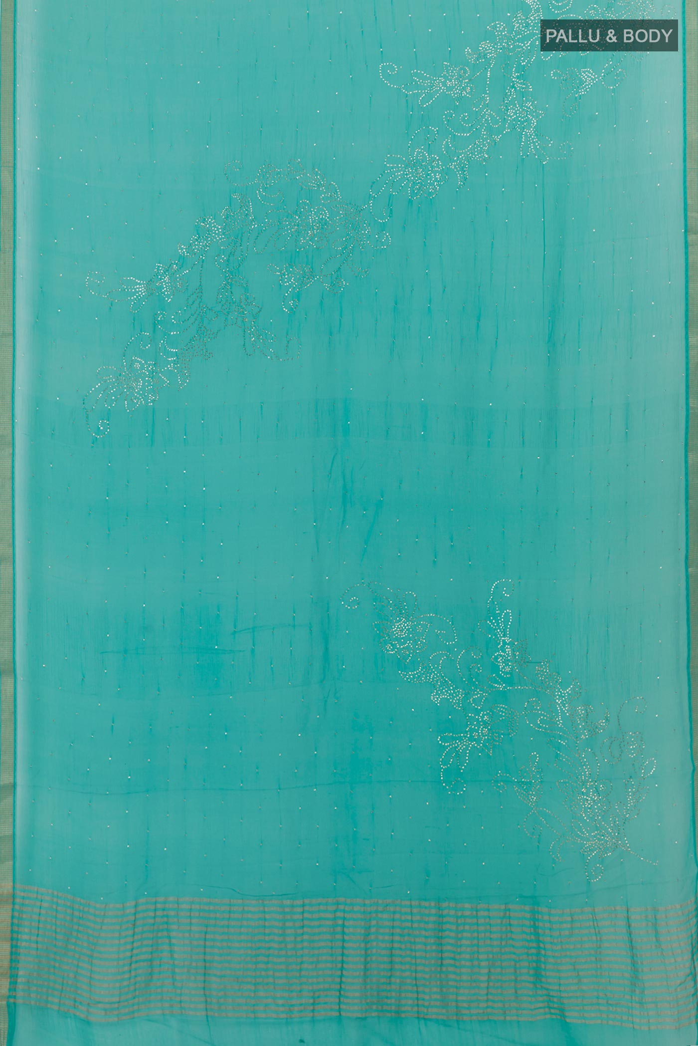 Flat view of Turquoise Mysore Chiffon Saree with Embroidery on the body and Zari Border. 