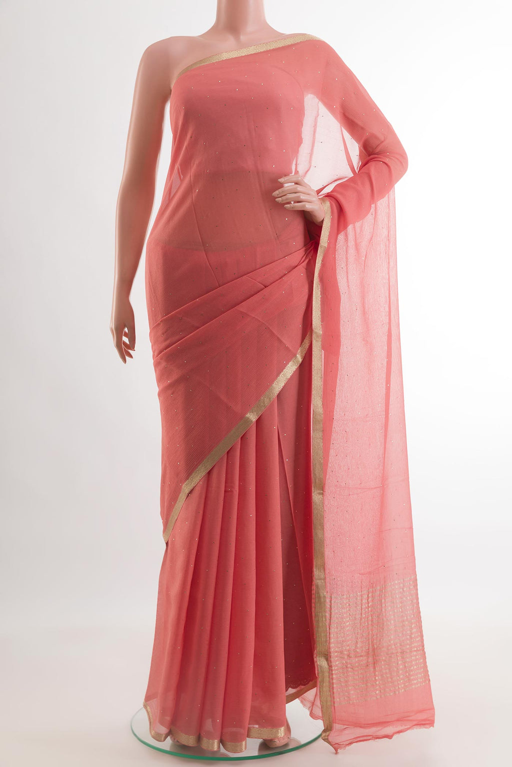 Coral Mysore Chiffon Saree with Embroidery on the body and Zari Border.  displayed on a mannequin