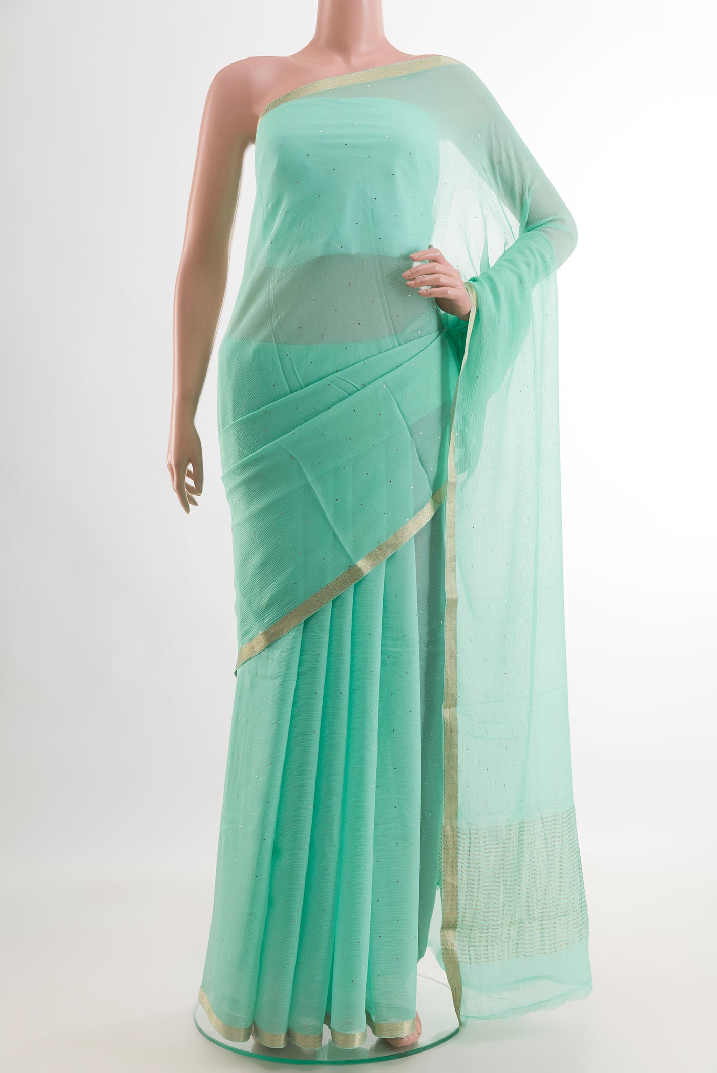 Light Blue Mysore Chiffon Saree with Embroidery on the body and Zari Border.  displayed on a mannequin