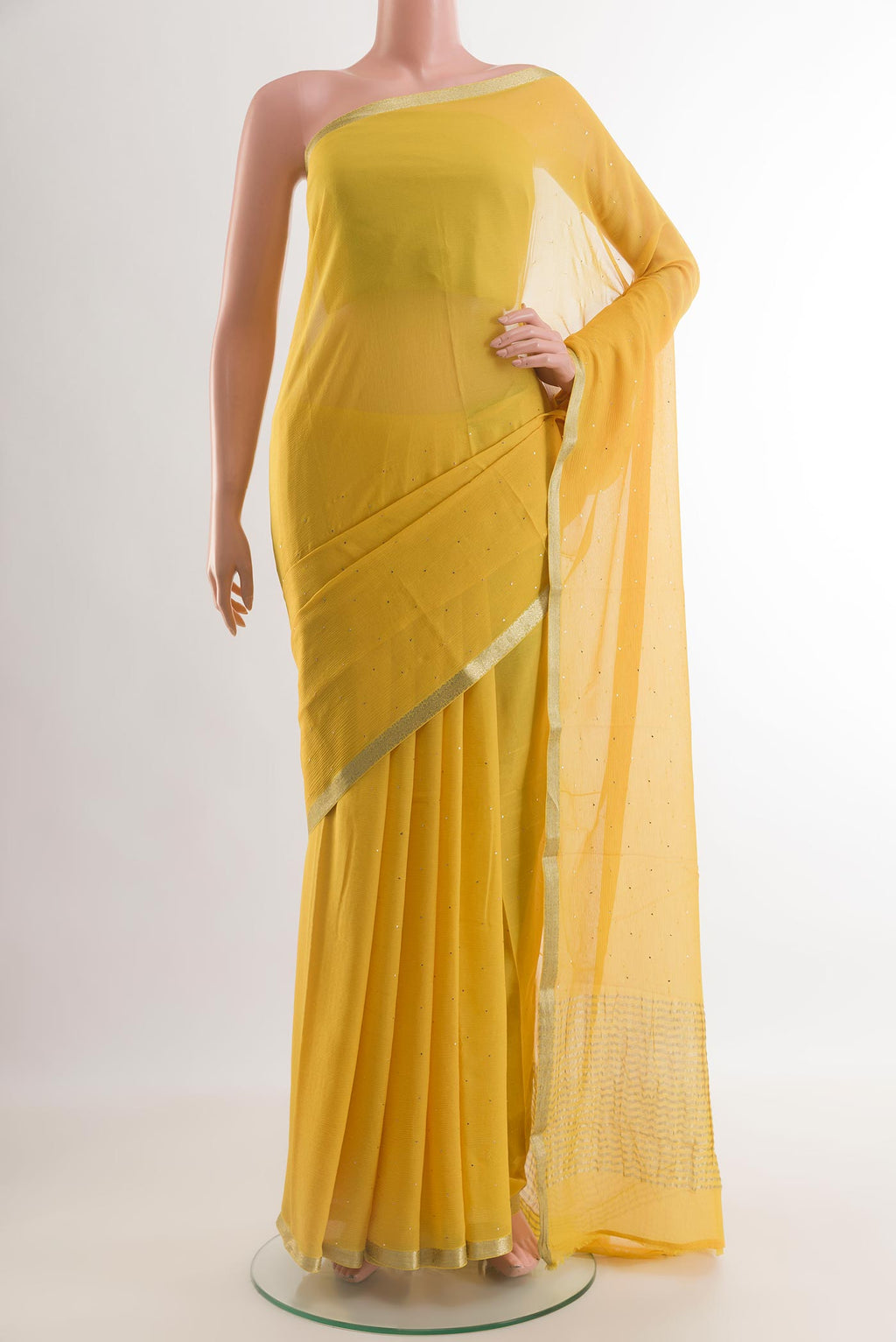 Yellow Mysore Chiffon Saree with Embroidery on the body and Zari Border.  displayed on a mannequin
