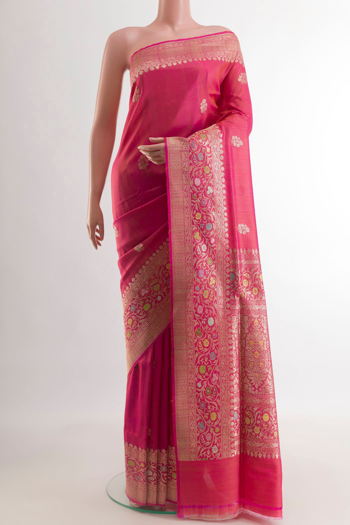 Pink Banarasi Silk Saree with Zari Butta on the body and Zari Border.  displayed on a mannequin
