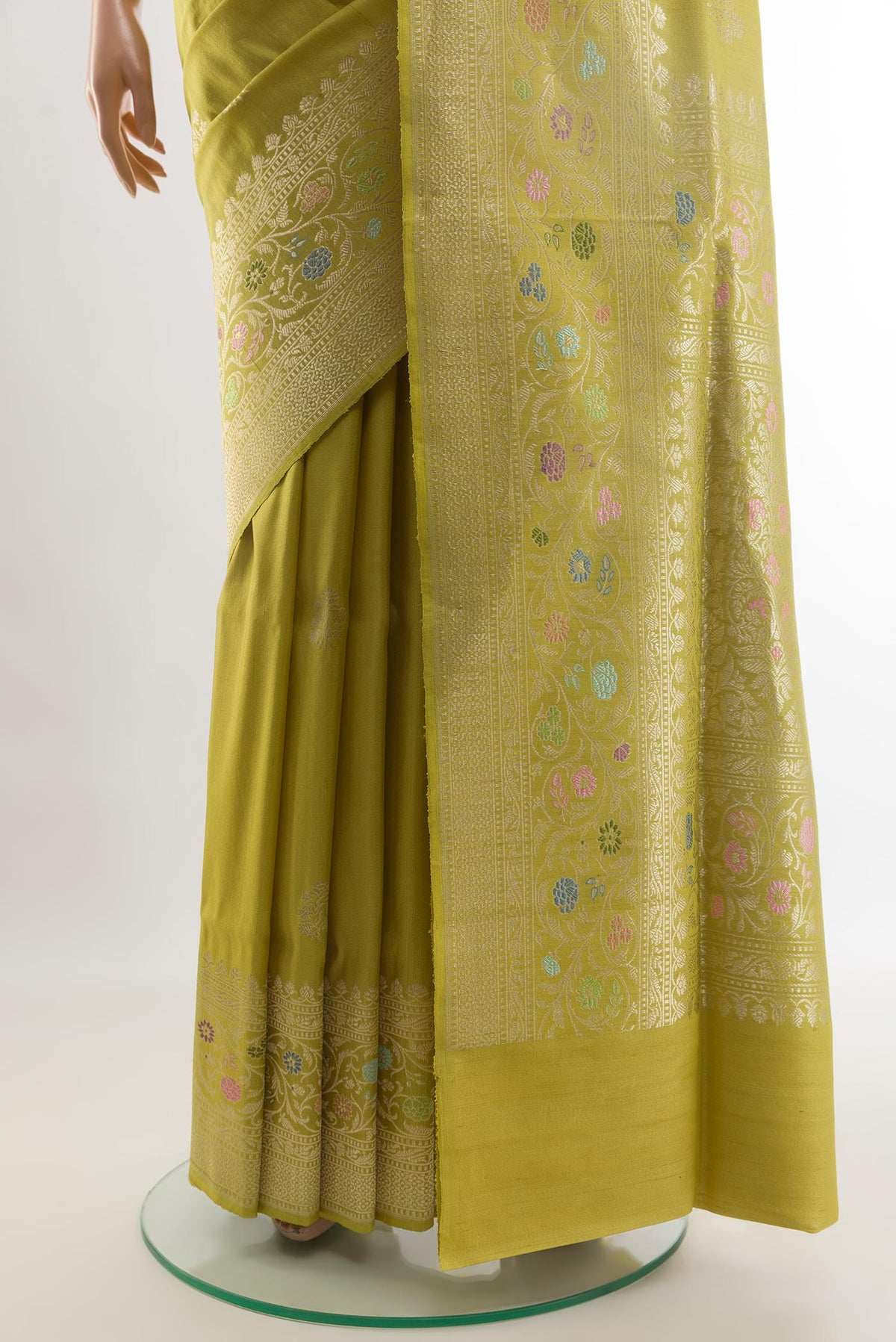 Pleats and pallu of Lemon Yellow Banarasi Tussar Silk Saree with Zari Butta on the body and Zari Border. 