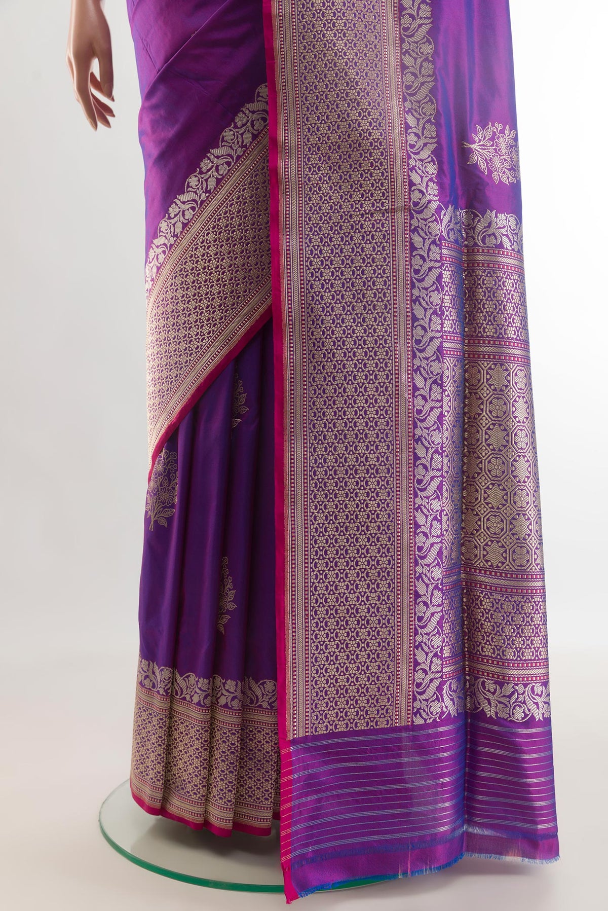 Pleats and pallu of Purple Banarasi Silk Saree with Zari Butta on the body and Zari Border. 
