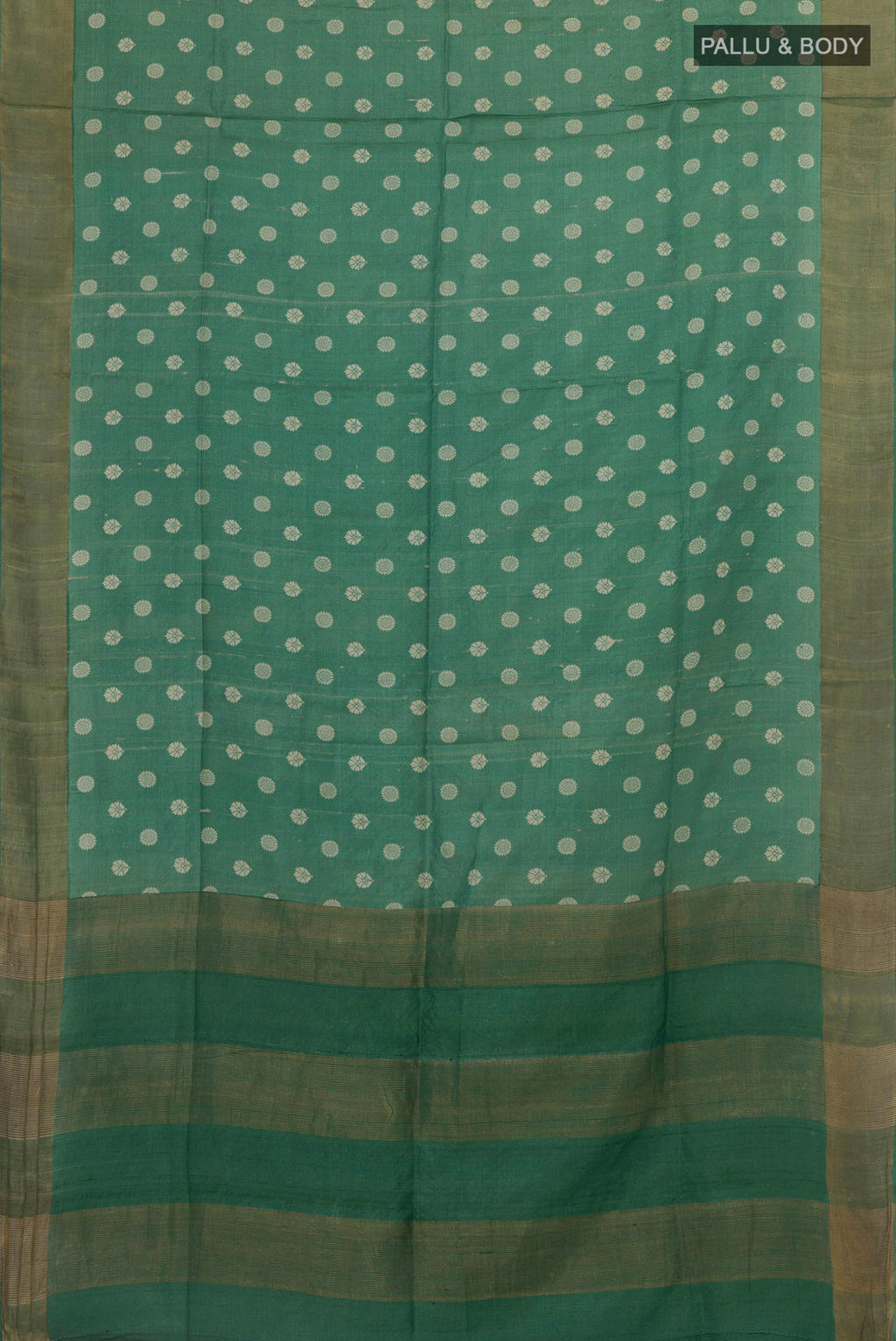 Flat view of Green Tussar Silk Saree with Printed design on the body and Zari Border. 