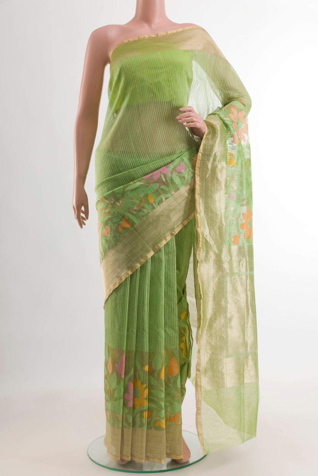 Pista Green Banarasi Kora Silk Saree with Plain Body and Zari Border.  displayed on a mannequin