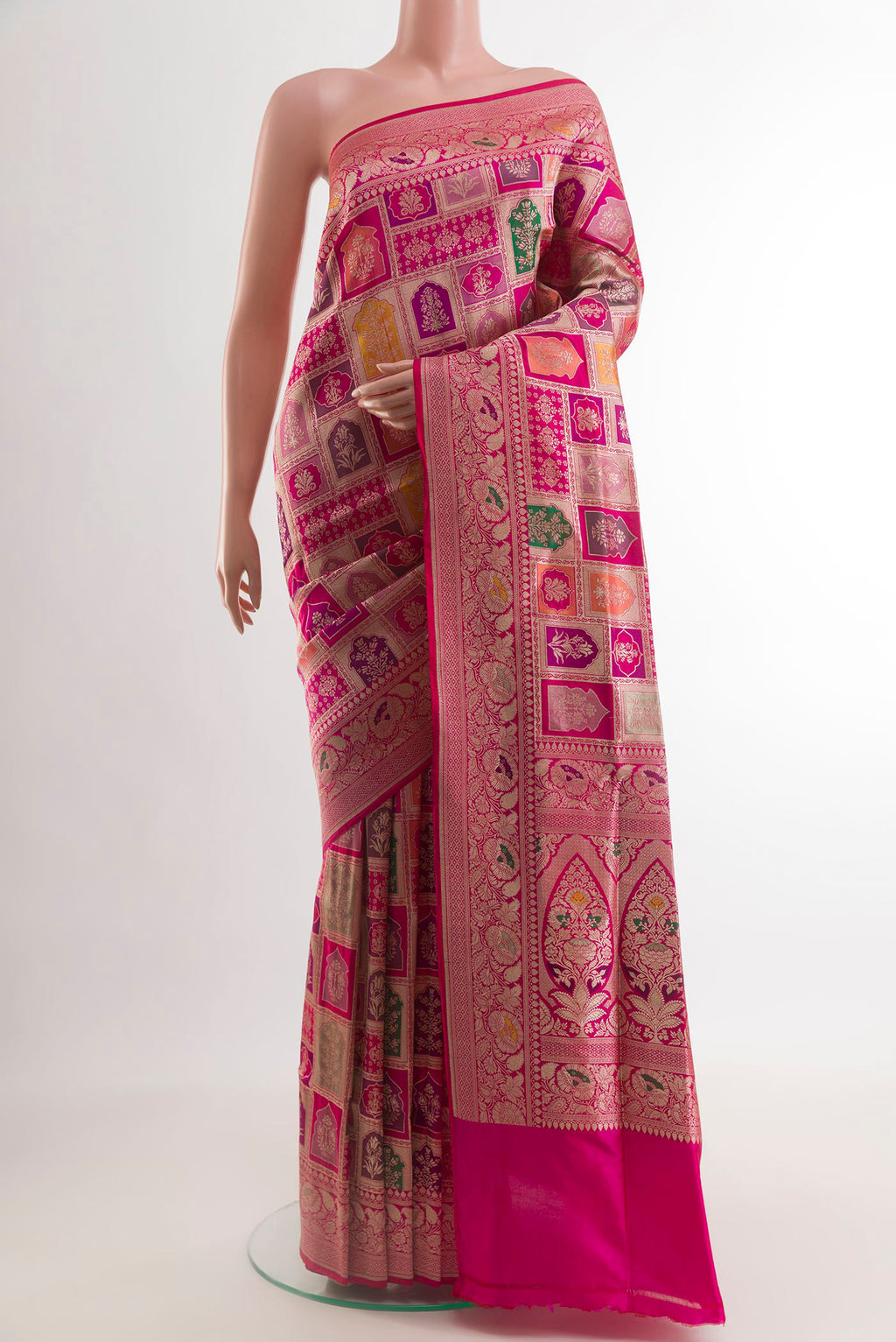 Multi Color Banarasi Silk Saree with Zari Brocade on the body and Zari Border.  displayed on a mannequin