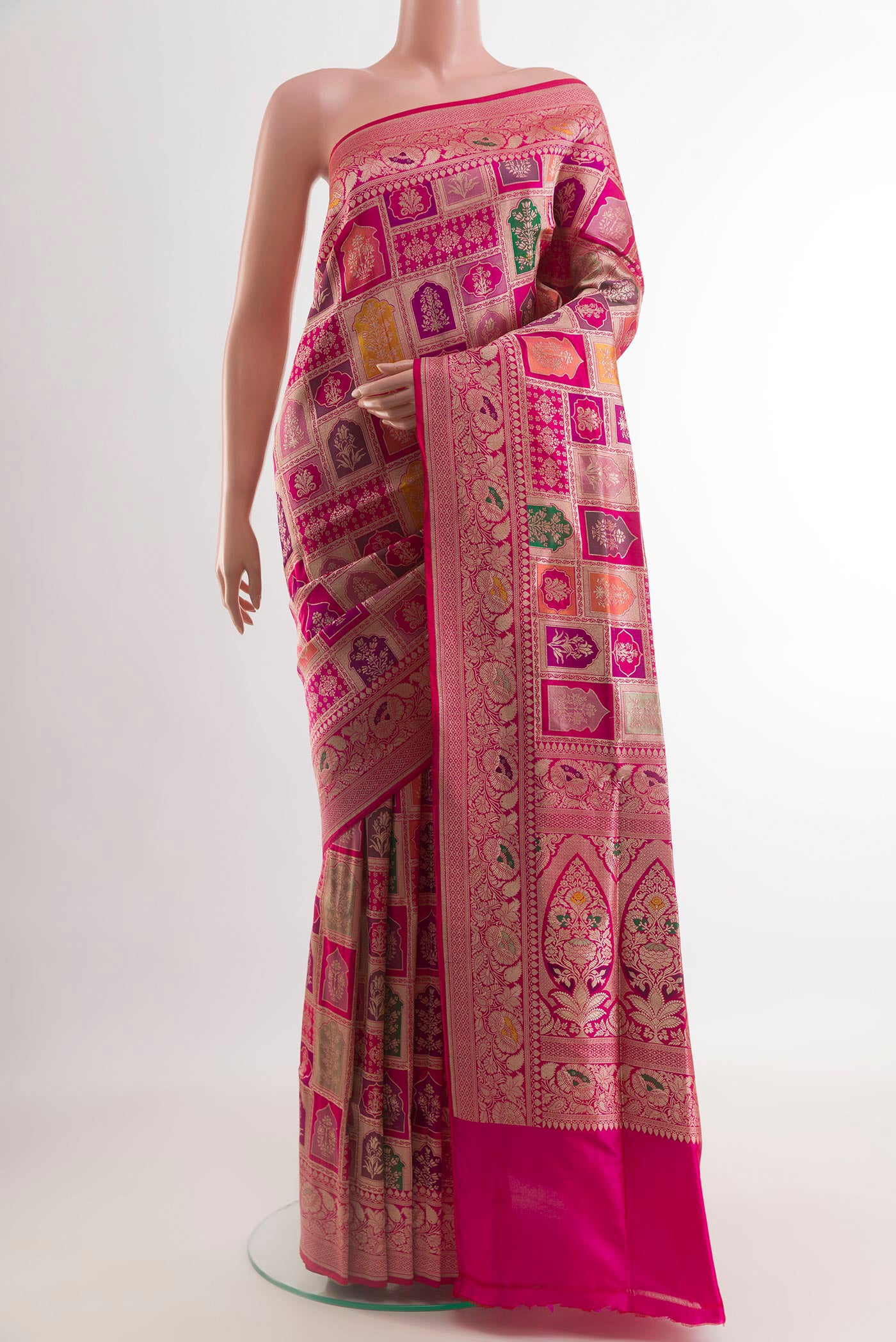 Multi Color Banarasi Silk Saree with Zari Brocade on the body and Zari Border.  displayed on a mannequin
