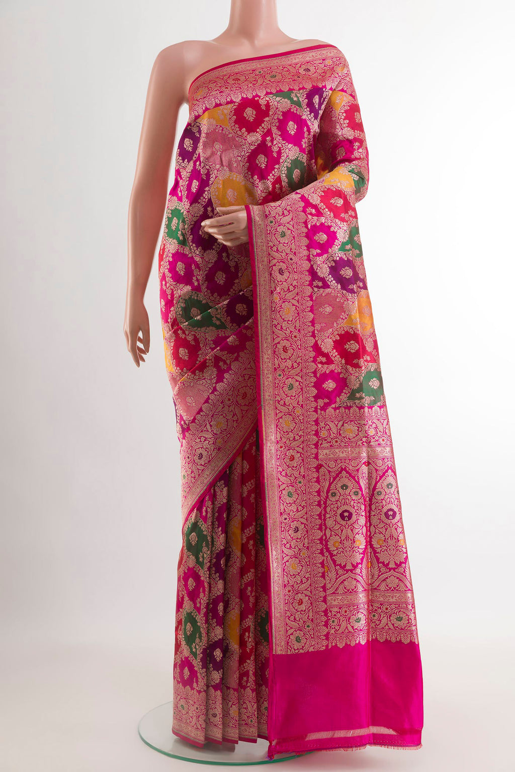 Multi Color Banarasi Silk Saree with Zari Brocade on the body and Zari Border.  displayed on a mannequin