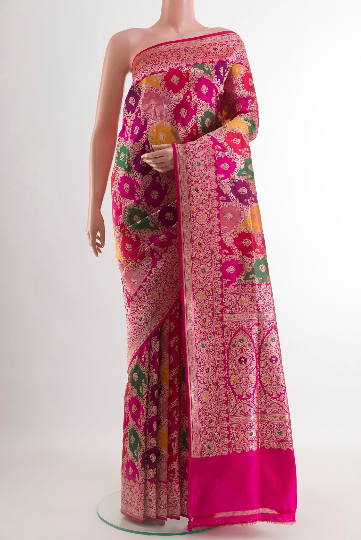 Multi Color Banarasi Silk Saree with Zari Brocade on the body and Zari Border.  displayed on a mannequin